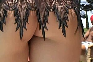 Isabel is outdoors having an interracial threesome with deepthroat and anal.