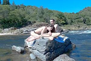 Passionate couple risked exposure on public beach