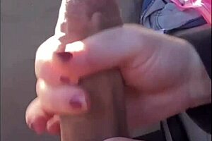 The guy masturbates his cock while watching a pussy squirting video