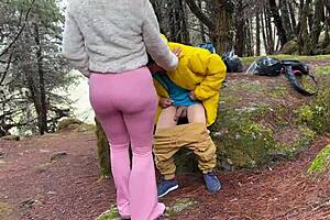 Stepmom sucks stepsons cock in field