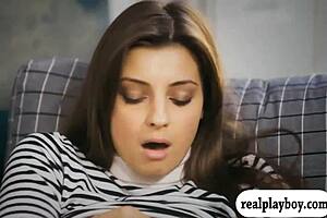 Watch the Sexy Brunette Babe Moan While Fingering Her Shaved Pussy Intensely