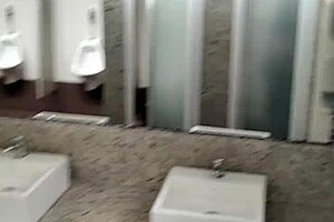 public bathroom scene with solo masturbation