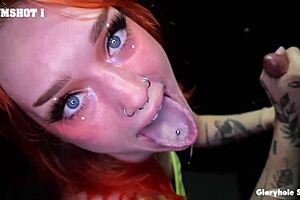 fiery inked redhead deepthroats cocks with sloppy passion at the gloryhole. her sucking skills are unreal!