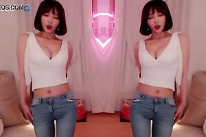 BJ Winter, the sexy Asian Korean, performs a seductive dance while teasing a blowjob.