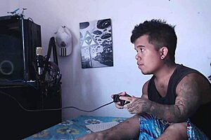 stepsister sneaks in horny to lick and fuck while he plays video games.