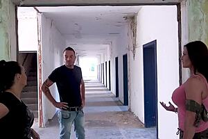 Two mature milfs engage in public threesome at abandoned barracks. They crave huge cocks and natural tits action.