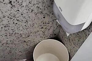 public bathroom scene with solo masturbation