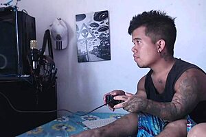 stepsister sneaks in horny to lick and fuck while he plays video games.