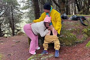 Stepmom sucks stepsons cock in field