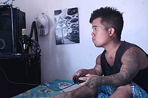 stepsister sneaks in horny to lick and fuck while he plays video games.