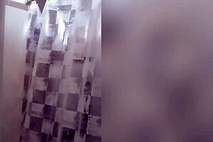 Cute latina showering