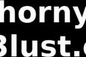 A hot woman bounces on a trampoline with her big natural tits