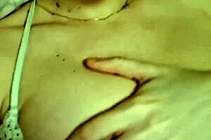 Elzakom shows off her sweet tits in lingerie.