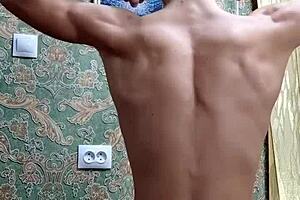 Flexible Skinny Boy Flexes Muscles After Study