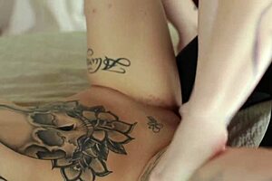 Tattooed lesbian goths slip their tongues into soft pussy.