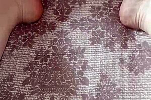 Ebony Beauty Rubs Thong on Bare Feet. Teasing Her Sexy Ass.