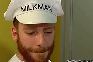 The milkman has fun with a shemale in the kitchen
