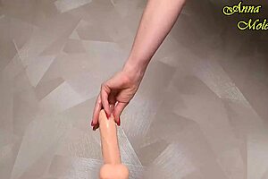 hey, wanna see this hot milf in red fishnets ride a dildo long and hard?