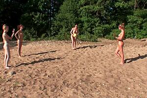 Four girls camp and play wild with each other.