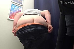 Curvy milf reveals big ass in satin panties