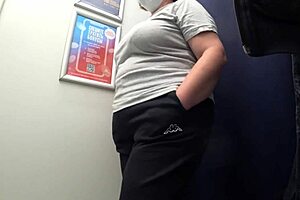 Big-ass curvy milf changes clothes in satin panties, watched by the fitting room camera in this amateur fetish.