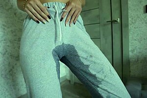 A petite 18-year-old teen experiences desperation and pees freely