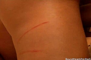 A massive lesbian slave gets punished and dominated