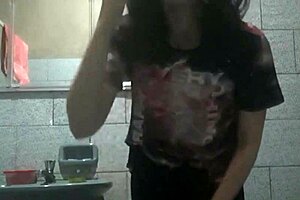 The girl with a perfect body masturbates in the bathroom