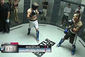 Girl is having fun with a fighter in the MMA ring