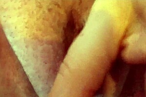 Britt, a pretty milf wife, uses her vibrator for close-up pleasure.