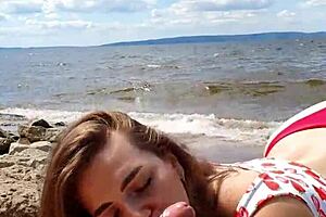 Beautiful teen 18+ gives close-up blowjob on the river