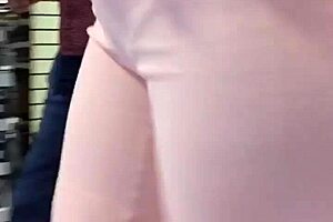 Mature milf shows off her big ass in casual setting.