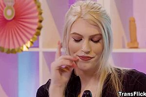 Transgender Izzy Wilde fucks horny female with toys at wedding expo booth.