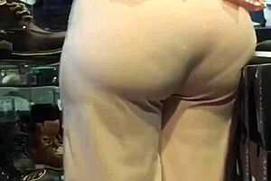 Mature milf shows off her big ass in casual setting.