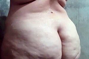 Latina BBW enjoys a relaxing bath in the shower