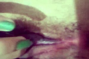 Safadinha masturbates with intense focus