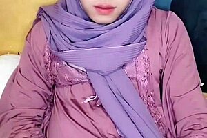 Hijab crossdresser enjoys solo masturbation in a captivating video