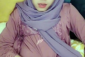 Hijab crossdresser enjoys solo masturbation in a captivating video