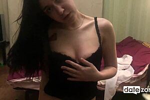 Raven-haired housewife stimulates her clit intensely and cums.