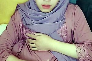 Hijab crossdresser enjoys solo masturbation in a captivating video