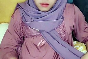 Hijab crossdresser enjoys solo masturbation in a captivating video