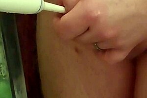 german amateur uses toothbrush and vibrator for intense bathroom session