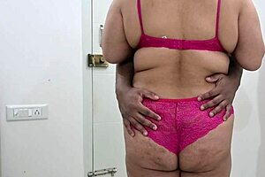 The sexy girl in a bikini gives her husband a hand job