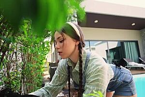 the girl is a good gardener and attractive