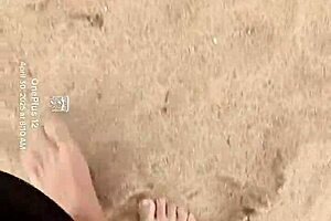 Bare feet exploring sandy shores