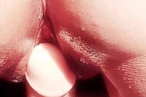 Mature woman teases wet shaved pussy with oiled toys in close up