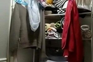 A Solo Filipina Woman with Small Tits Performs in a Video