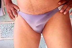 Wearing my lover's shiny blue panties in an intimate moment