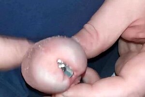 Jayq stretches urethra with huge steel plug