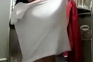 A Solo Filipina Woman with Small Tits Performs in a Video